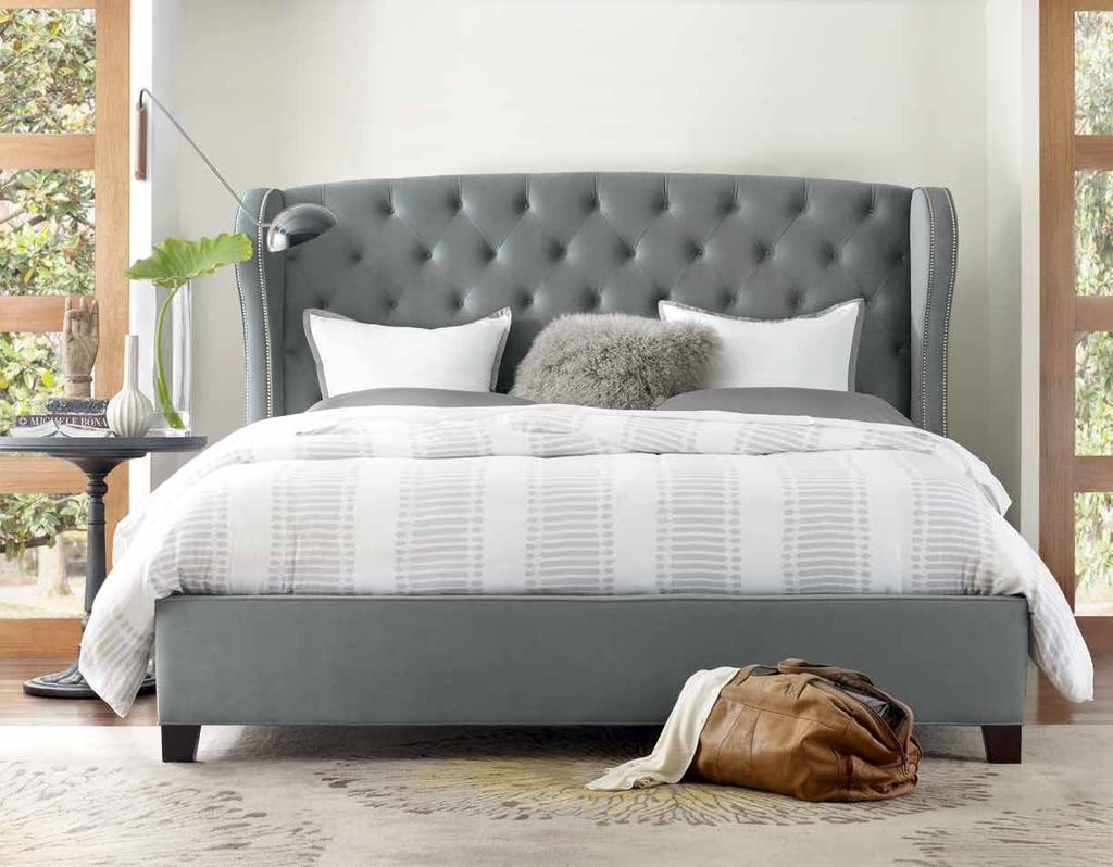 HERON TUFTED The Heron Tufted Bed shown here in a Seraphine Iron base fabric with a pewter nail-head 11 1/2 Rail with Block Leg in our Espresso finish 762-94866 Heron Tufted 64 Tufted Upholstered