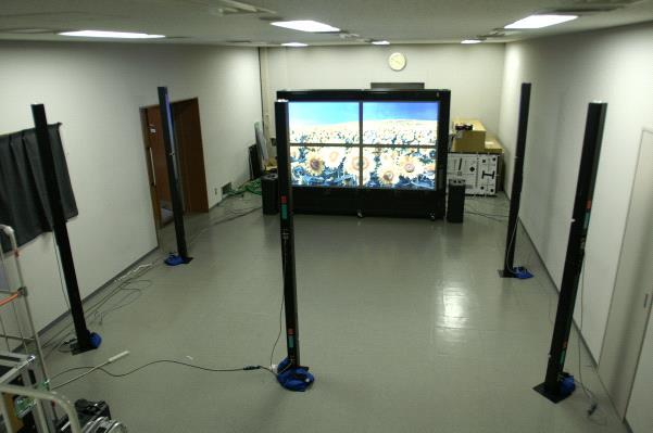 2 multichannel sound system with UHDTV FPD on which compact loudspeaker units are rigged up to reproduce frontal sound channels as Fig. 5. FIGURE 5 Home 22.