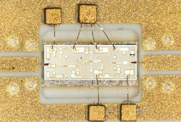 Fig. 6: Photo of the GaAs LNA P35-5114 from Marconi Caswell Limited on Ferro A6M tape with screen printed mixed metal conductors (gold and silver) 25 2 15 1 5-5 -1-15 -2 S21 MCM OW 1 OW 2-25 1 15 2