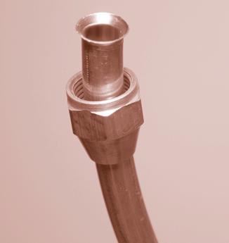 sufficient length of the flare. Position the yoke with the flaring cone over the tube end and clamp the yoke in place. Turn the handle of the yoke clockwise (Figure 31).