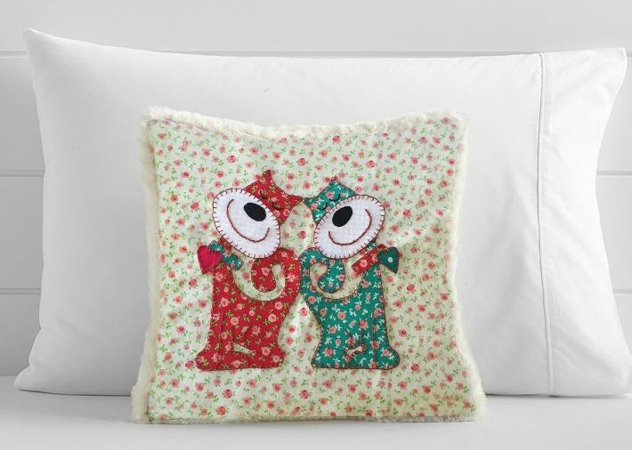 Purrfect Love Pillow You will use: 1/2 yard light colored fabric for pillow front and back 1/4 yard ea. red and turquoise fabric Scraps of white and black fabric Fusible Web 12" Pillow Form Cut (1 ea.