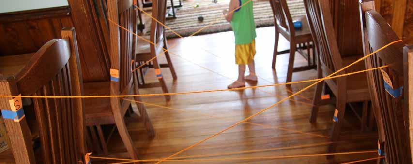 Follow the string back and forth and find all the S s. Have your child pull the string through, but help them as it can get caught and break.