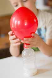 Hold tight to where the balloon is secured to the bottle. Watch the balloon blow up! Don t add too much of either vinegar or baking soda, it could cause the balloon to erupt.