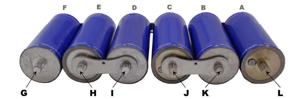 2.6 Place lugs attached to power cables (1/0 AWG cables shown in Figure 7) over the remaining two threaded terminals of the cells at the ends of the