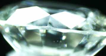 Symmetry features Examining a polished diamond for its Symmetry, graders use a series of cues to accurately decide its overall Symmetry