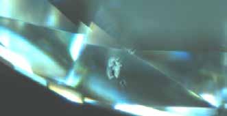 Accidents can happen using this light source when reflections change the laser s focus from the diamond s surface to its interior. These accidents form internal damage that affect a diamond s clarity.