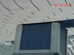 When a chimney chase or other feature with siding and trim is installed above