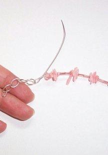 Step 3 Attach the bracelet clasp and extender chain Untie your knot or remove the tape.