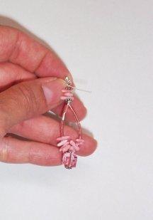 Make a loop with your round nose pliers, attach the loop through your earring component, then close the loop.