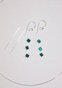 Step 1 Gather your supplies 2 Headpins of a gauge that will fit through your bead holes 6 Swarovski crystal beads (4mm cube) in your choice of colors. I used Emerald crystals in my design.