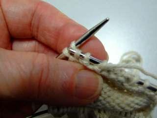 Tie a loose knot in the end to indicate the last loop (this is the end you will undo later to pick up your stitches to begin working in the round).