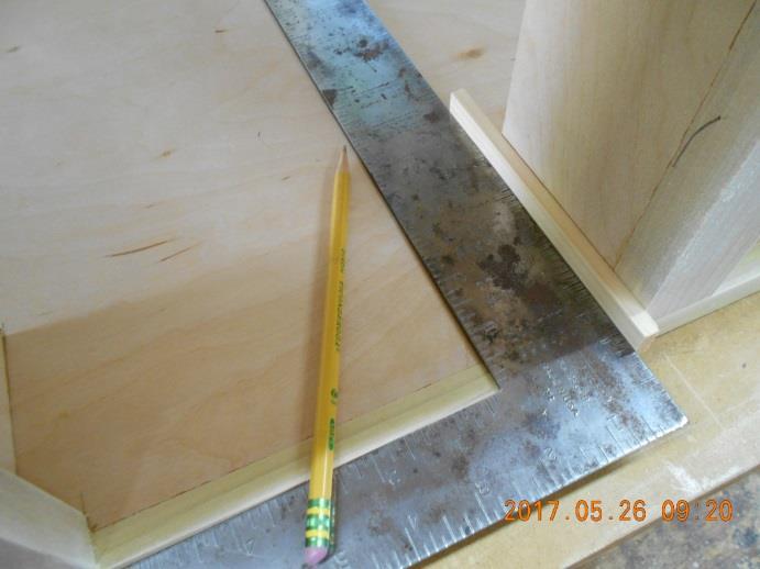 Using the 2 inch wide blade of a framing square with a ¼ thick spacer, I then put a line on the
