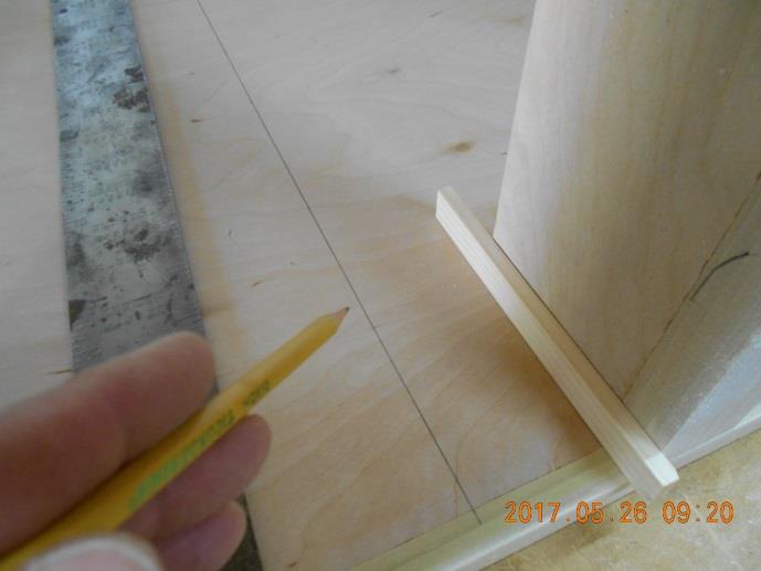 That will also place the bottom edge of the drawer ¼ above the divider.
