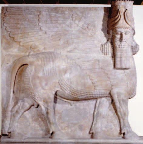 FIGURE 6.1 Monumental relief of a winged bull with human head. c. 722 705 B.C. Limestone. 487.68 487.68 cm (16 16 ). Khorsabad, Iraq.