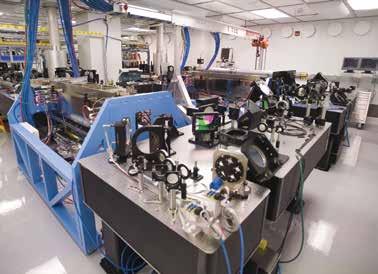 July 2014 Chapter 3: OMEGA Extended Performance (EP) Laser System Page 3.9 Periscope to Beamline 2 Periscope to Beamline 1 Beam 2 15-cm glass amplifier Beam 1 tables Figure 3.5 Laser Sources Bay.