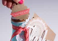 6 To create the top feature, simply use a hand punch to punch a decorative card, and attach it to the lid.