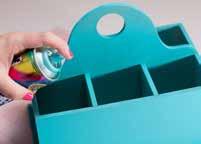1 Wipe the craft caddy clean. Spray-paint it turquoise and let it dry completely.