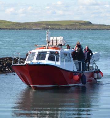A boat (Ocean Spray) had been chartered to transport the materials from Donaghadee Harbour to the island.