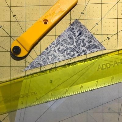 foundation paper. Trim 1 4 (.64cm) outside the outer dashed line. Cutting WOF = Width of Fabric; LOF = Length of Fabric Fabrics A-P, cut from each: (2) 3 1 2 x WOF (8.