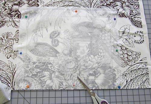 3. From the fabric for the bag exterior, straps exterior, exterior pocket, and facing (Peacock Toile in Chocolate in our sample), fussy cut TWO 15" wide x 18" high panels. Fussy cut exterior pocket 1.