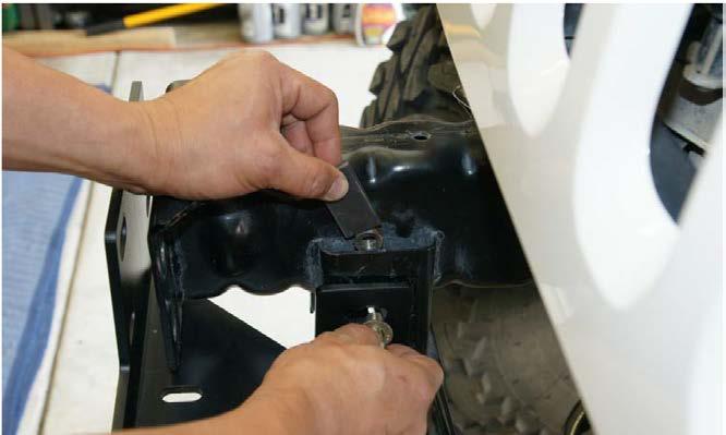 13. PLACE THE LOD SIGNATURE SERIES WINCH PLATE IN BETWEEN THE FRAME RAILS OF YOUR JEEP JK AND LOOSELY SECURE IT