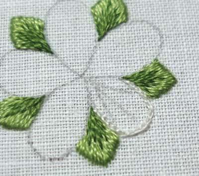 Lesson 8, Page 5 For the petals, begin with Ecru and split stitch a line from the inside tip of