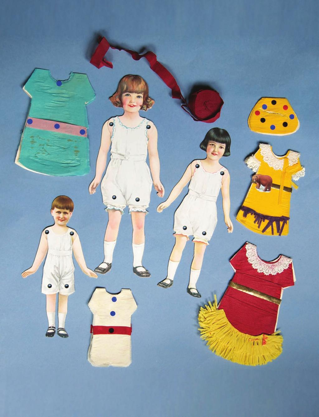These three Dennison Company paper dolls with clothes are part of a boxed set that probably dates from the 1920s.