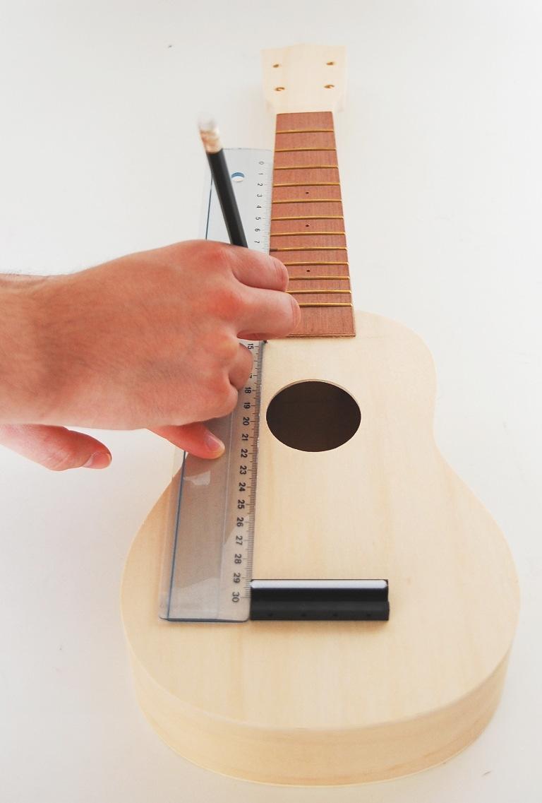 If you use another hammer you should place some rubber or plastic between the frets and your preferred tool so that the surface of the frets will not be damaged.