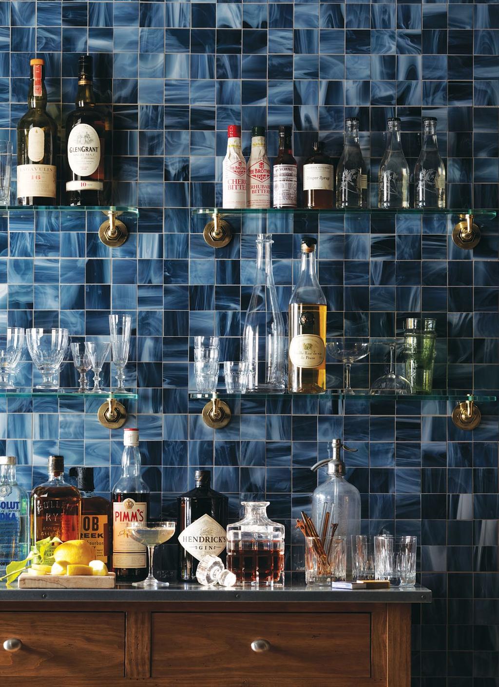 IN MOSAIC OR BRICK, CERAMIC OR STONE, WATERWORKS PRODUCTS LEND UNEXPECTED INTEREST TO SURFACES THROUGHOUT THE HOUSE.