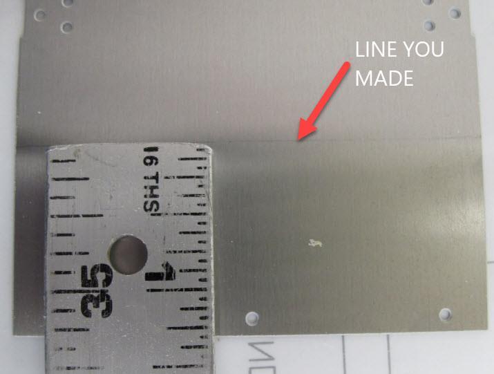 See photo below Using 3/32-inch music wire or rod place it along the marked line you made securing the aluminum and bend 90-degrees.
