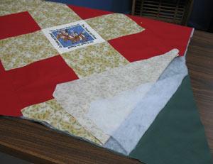 Lay the fabric on top of the quilter's cotton and cut out the shape.