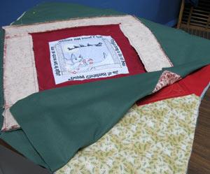 Side 2, Folding Flaps Trace and cut four more pieces of quilter's cotton using the tag board flap pattern.