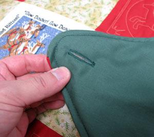 Add a button hole 3/4 inch from the tip of the left flap. Flip the sham over so that Side 1 is right side up.
