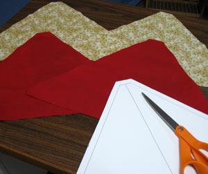 Trace and cut out four of the pattern shapes on the quilter's cotton.