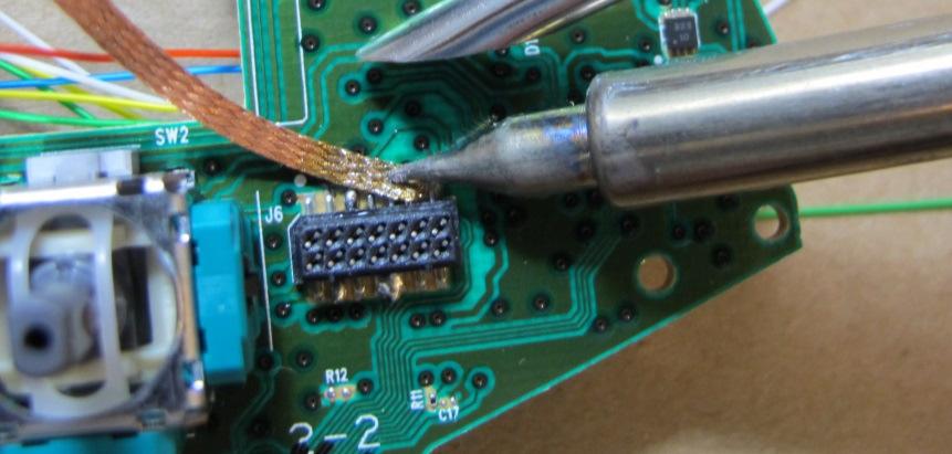 This does not always work but works best with a clean soldering tip and first allowing the solder to cool, If you keep trying this method on solder that is hot it will just become