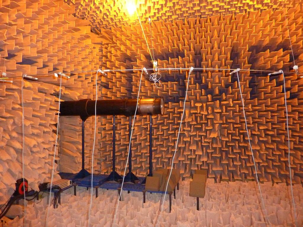 Chapter. Intake liner no-flow rig test in ISVR anechoic chamber 76 Figure.: View of duct and polar microphone array in the anechoic chamber.