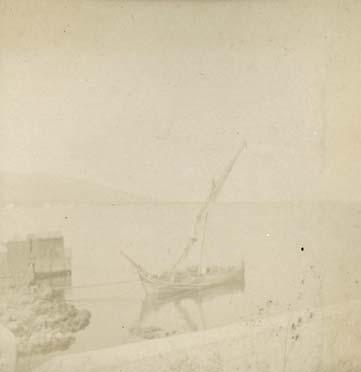 Fisherman boat at the sea shore. ca. 1903.  12,00