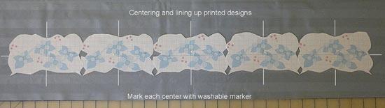Then she arranges the templates on her fabric or item, marking each center with a