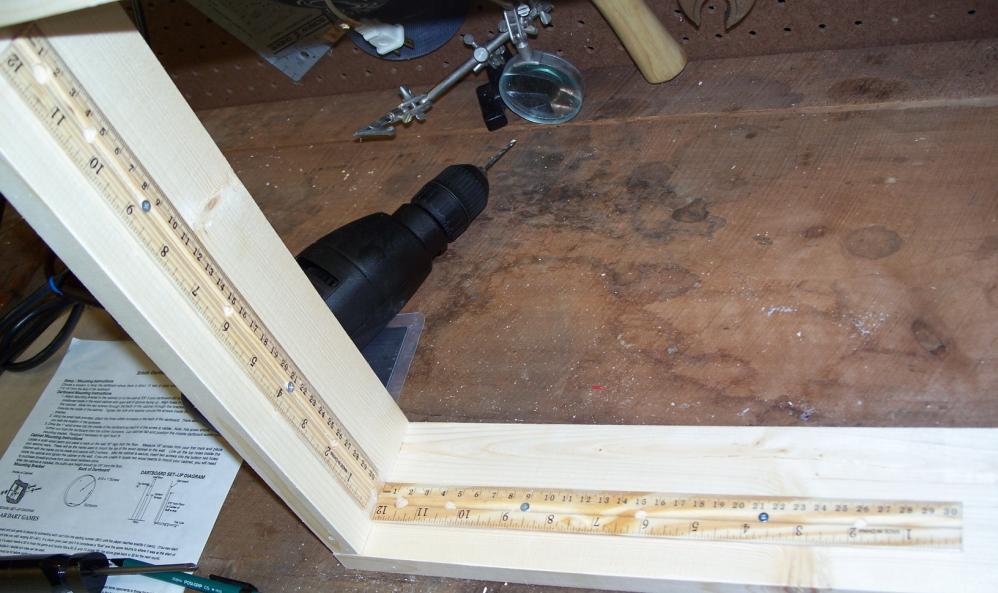 15. Unscrew the plywood base and set the side frame on edge.