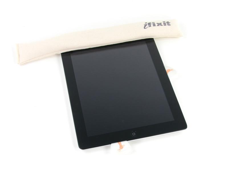 On ipad 4 models, insert the pick to a maximum depth of 1/2 inch in this area,