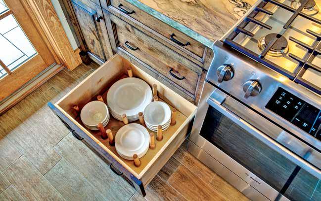Above: Cabinet options include drawer plate storage.