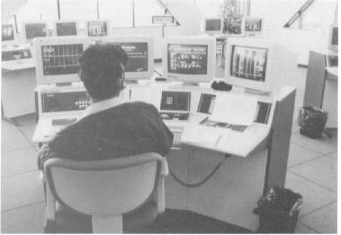 Exhibit 3-5. Los Angeles County CAD System display monitors at a Tactical Radio Operator Console.