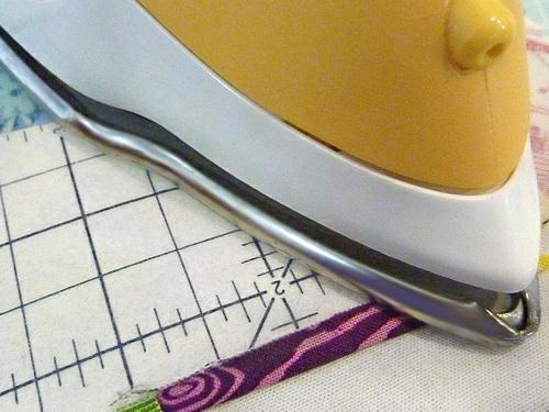 If, after pressing, there is one end of the towel that seems more even, use this end to apply the accent band. 2.