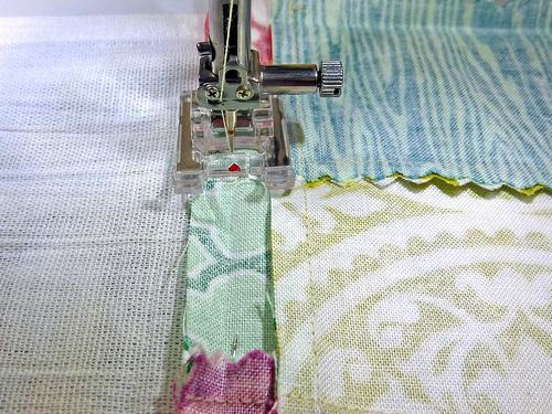 Fold the accent band up along the seam line so it is now right side up on the right side on the towel.