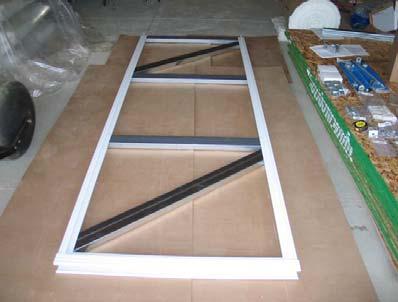 Confirm the available door space - Measure distance between bottom of header and finished floor. Deduct 1 top seal space, 1.5 bottom seal space and 2 for the bottom rail, a total of 4.50.