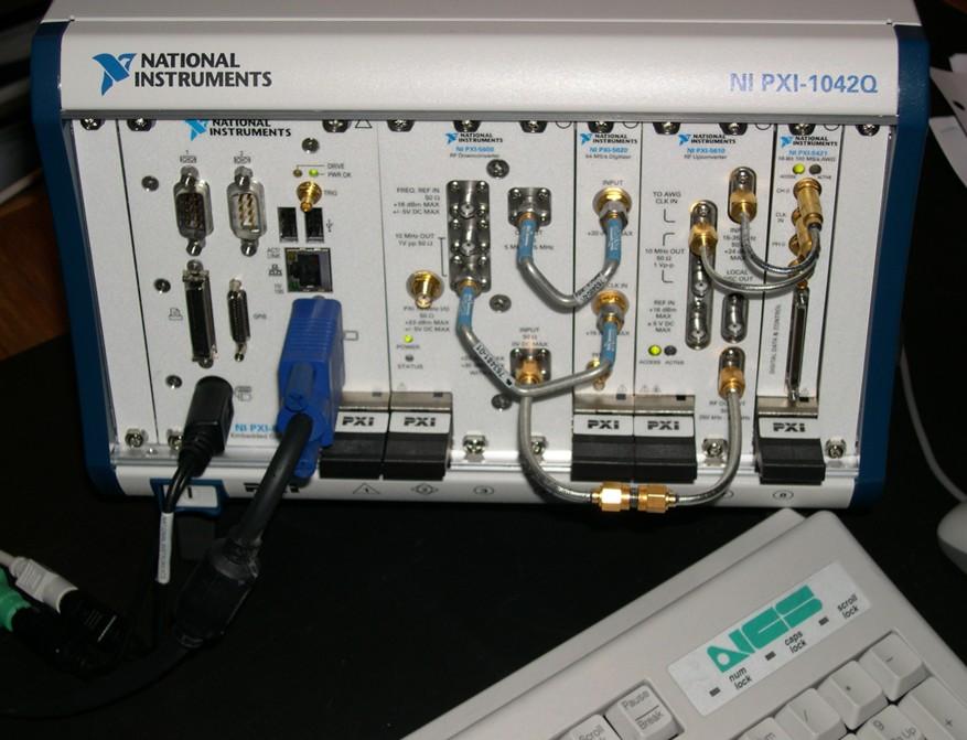 OpenStax-CNX module: m14500 3 Figure 2 Figure 2. Front of National Instruments as congured in Figure 1. Connections between hardware units are made using rigid coax.