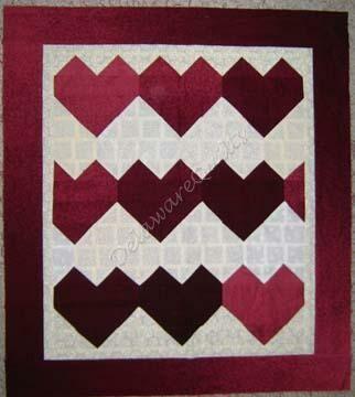 Then quilt and bind, and your Folk Art Hearts are finished!