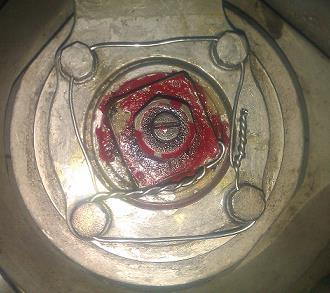 c) d) Figure Locking methods: a) anchor, b) safety wire (vertical hinge vent plug), c) safety wire (oil filler plug in a hydraulic silencer), d) locking in the fire protection system Another locking