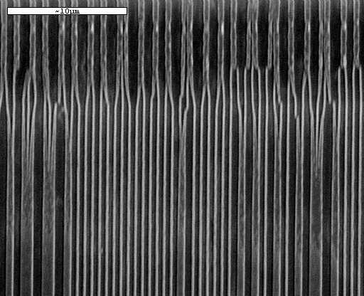 reflectivity and undesired features in the reflection spectrum of the final grating. Adhesion of the photoresist to the D-fiber is a constant battle. Figure 3.
