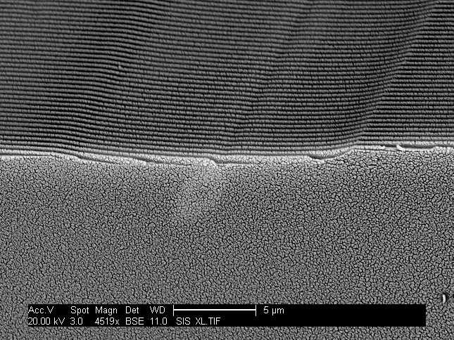 Figure 4.14: An SEM image showing the completed grating in the rotated core fiber. φ polarizer laser beam Figure 4.